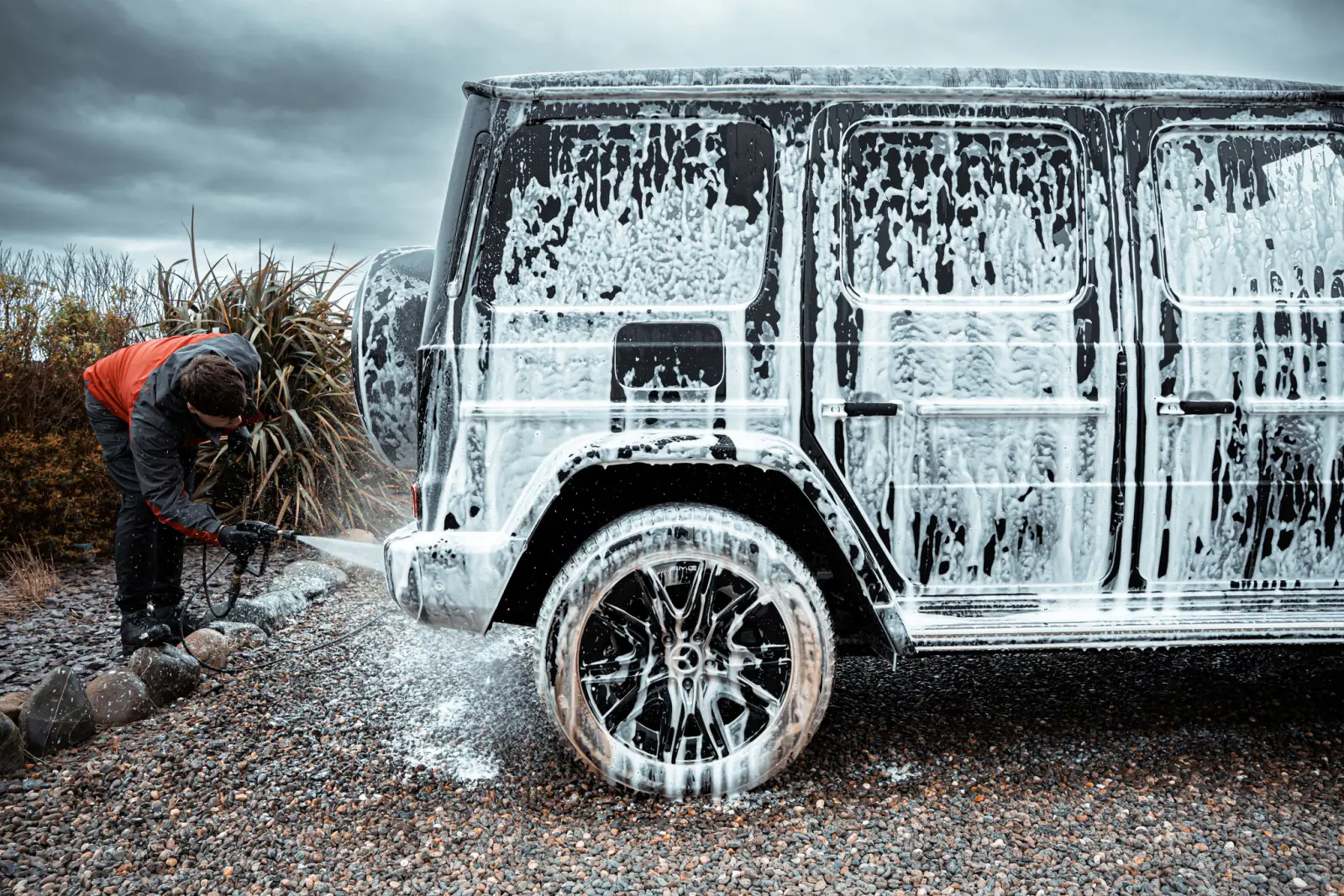 A Mercedes G-Wagen mid snow foam wash at our Douglas unit